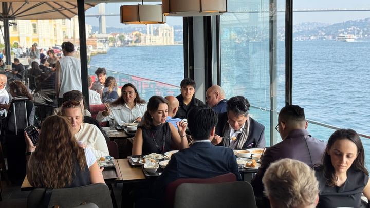 The delegation at lunch, the Bosphorus Bridge behind
