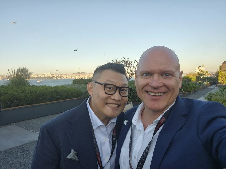 John Zai and Russ Shaw CBE as the sun sets